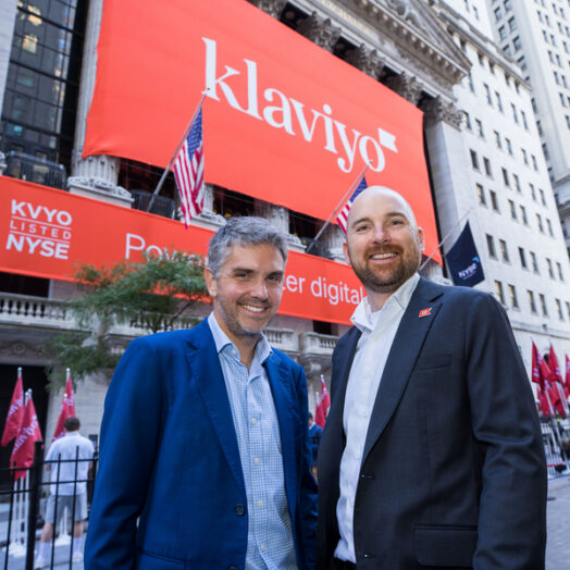 Andrew Bialecki and Ed Hallen pose outside the New York Stock Exchange