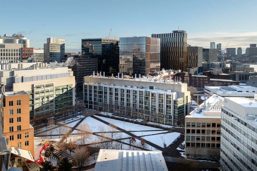 Aerial view of the MIT campus in winter, with Kendall Square in the background